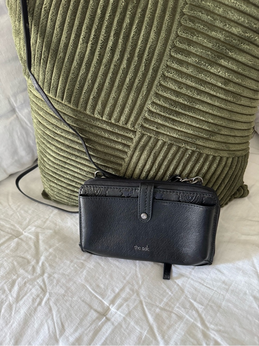 The Sak Black Crossbody Phone Wallet with Subtle Embossed Trim